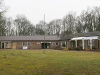 Voormalige Groene Kruisgebouw met badhuis en dubbele woning
